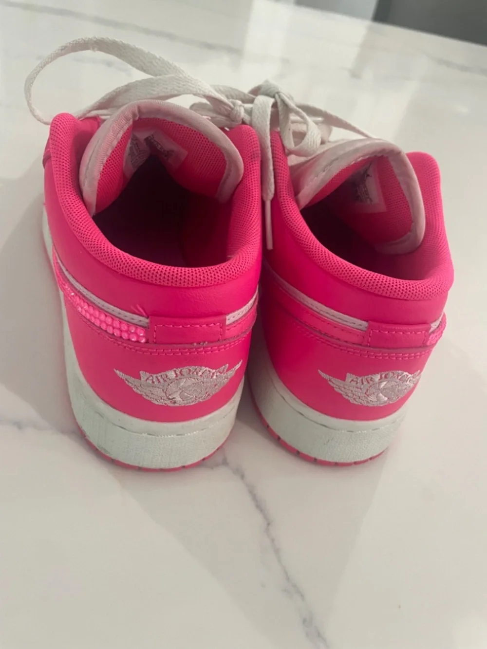 Pink custom embellished Nike dunks